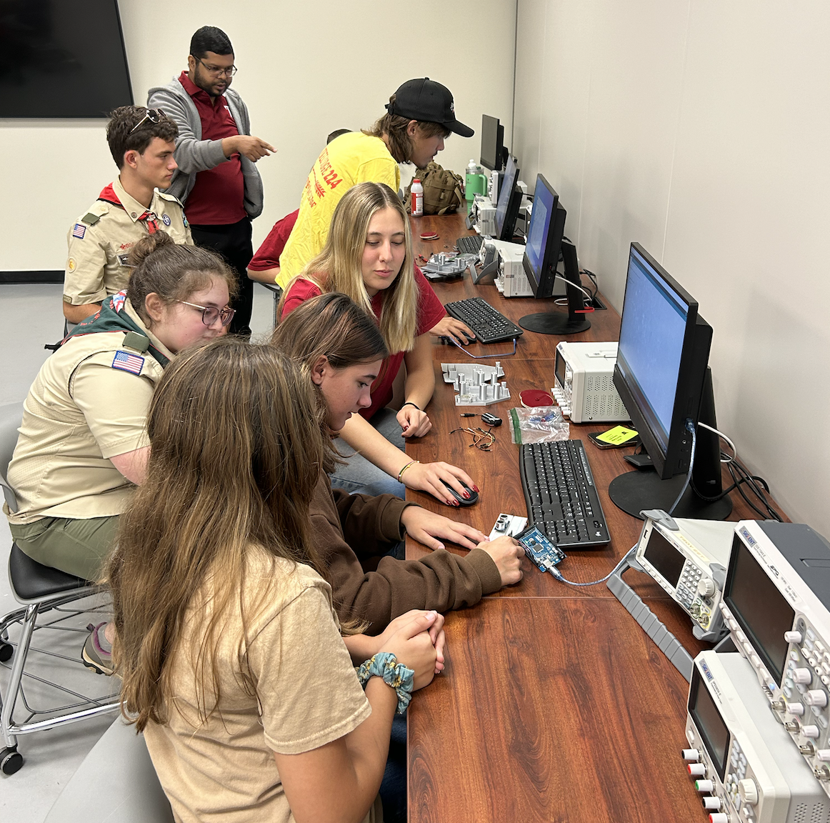 Students engaging in optics activity